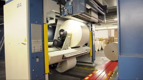 Paper rolls in a printing machine of a large print shop Stock-Footage 84193140