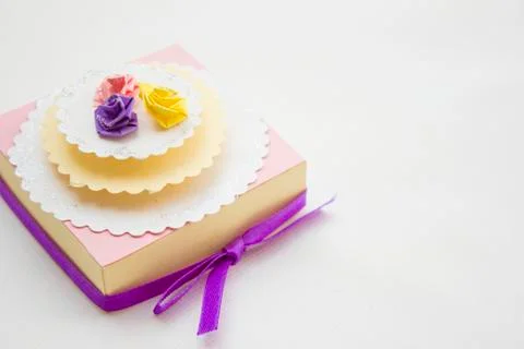 Paper roses on a box Stock Photos