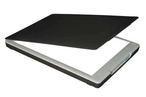 Paper scanner on white background Photos