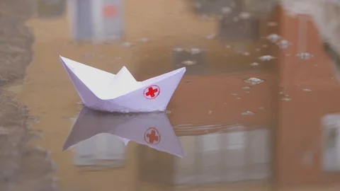 Paper Ship Sailing Puddles Stock Footage 105263376