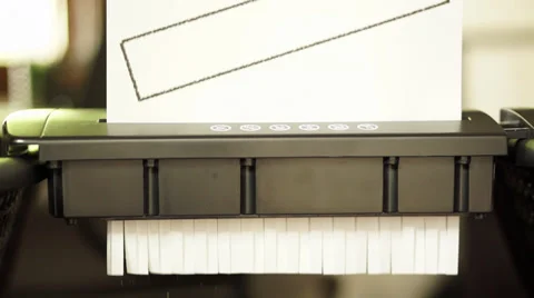 Paper shredder destroys blank with frame paper Stock Footage 39881358