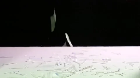Paper shredder strips falling into a pile Stock Footage 56947955