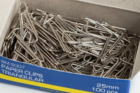 Paper silver clip in a box Stock-Fotos