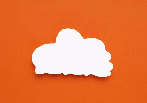 Paper speech bubble in shape of cloud on orange background, top view. Space.. Stock Photos