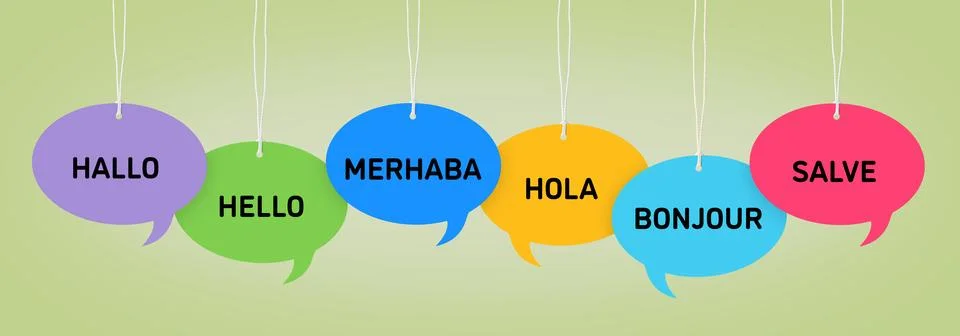 Paper speech bubbles with greetings in different languages hanging on sage .. Stock Photos