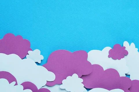 Paper speech bubbles in shape of clouds on light blue background, flat lay... Stock Photos