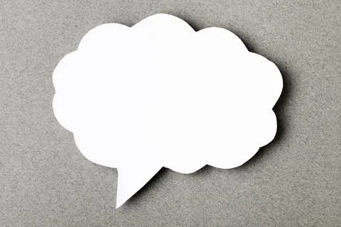 Paper speech cloud  on grey background Stock Photos