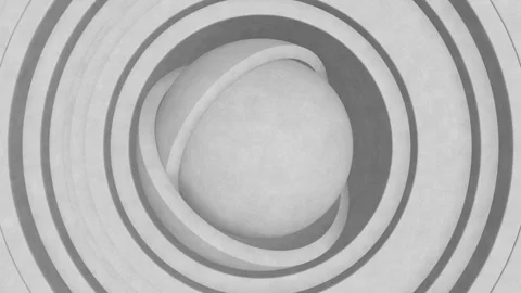 Paper sphere inside of two hemispheres surrounded by moving paper rings Stock Footage 271341067