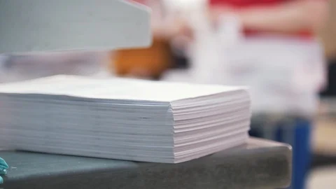 Paper stack in front of worker in the typography Stock Footage 88901445