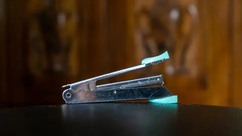 Paper stapler with blurred background Stock Photos