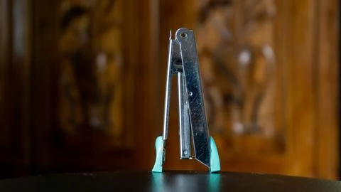 Paper stapler with blurred background Stock Photos