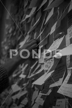 Paper stickers with different inscriptions and drawings glued to the ...