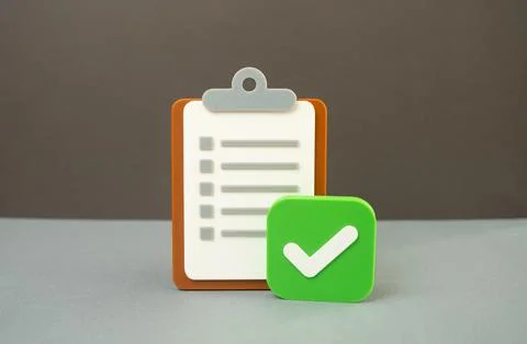A paper tablet and an approval checkmark. Passing a test, meeting the requi.. Stock Photos