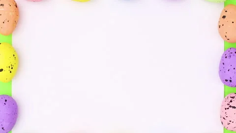 Paper for text surrounded with Easter eggs. Stop motion Stock Footage 149330925