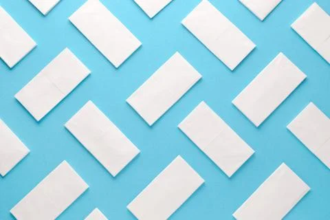 Paper tissue abstract pattern on blue background Stock Photos