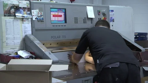 Paper trimming with guillotine machine Stock Footage 112064099