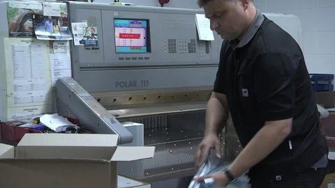 Paper trimming with guillotine machine Stock Footage 112064382