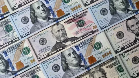 Paper US dollar bills of various denominations and cent coins as a business tool Stock Footage 338011962
