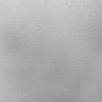 Paper on the wall surface with a textured rough coating of silver color Stock Photos