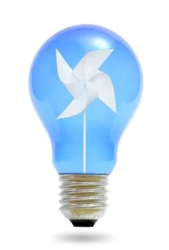 Paper windmill in a blue light bulb. Stock Photos