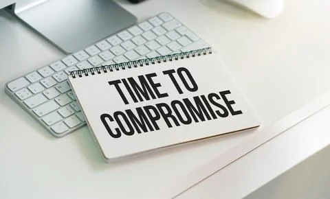 Paper with word Time to compromise on a table, concept Stock Photos