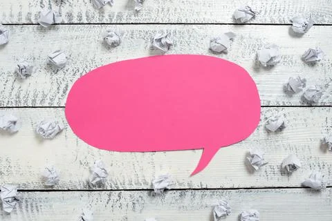 Paper Wraps Placed Around Speech Bubble With Important Information. Wrinkled Stock Photos