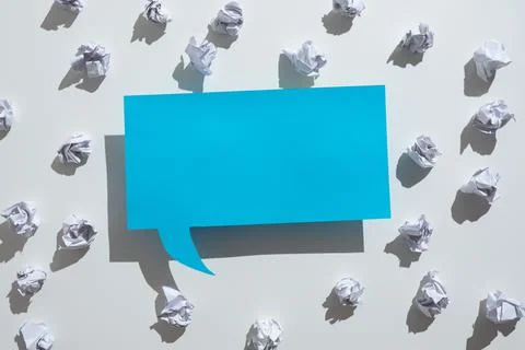 Paper Wraps Placed Around Speech Bubble With Important Information. Wrinkled Stock Photos