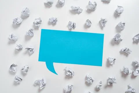 Paper Wraps Placed Around Speech Bubble With Important Information. Wrinkled Stock Photos