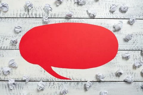 Paper Wraps Placed Around Speech Bubble With Important Information. Wrinkled Stock Photos