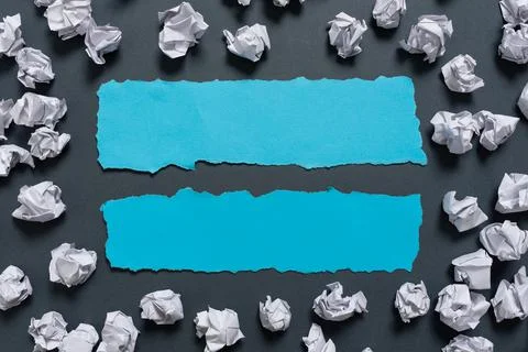 Paper Wraps Placed Around Two Important Informations. Wrinkled Notes Arranged Stock Photos