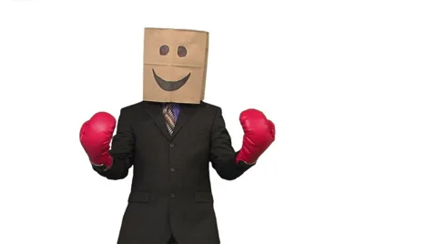 The paperbag man is boxing. white background Video stock 49863304