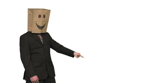 The paperbag man is presenting your text. white background. Stock Footage 49863345
