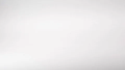 Paperclips dropped in slow motion Stock Footage 117349416