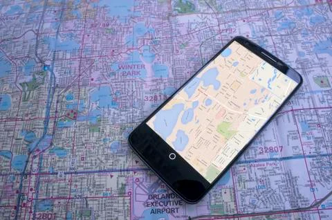 Papermap and electronic map Stock Photos