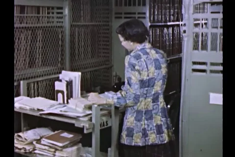 Papers, documents, files, and reports in National Archives building - 1950 Stock Footage 106244678
