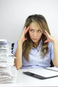 Paperwork headache Photos