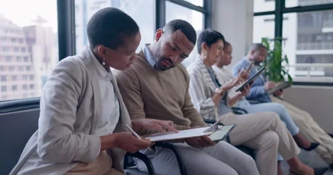Paperwork, job interview and people in waiting room writing resume information Video stock 246523019