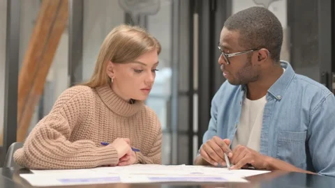 Paperwork by Multi Ethnic People in Office Stock Footage 302872508