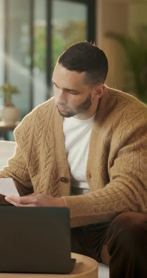 Paperwork, reading and man with laptop for remote work, data entry and audit Stock Footage 335262367