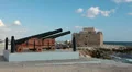 Paphos Castle on Mediterranean seashore and old cannons in Cyprus HD Footage