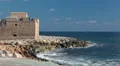 Paphos Castle on Mediterranean seashore in Cyprus at sunny day HD Footage