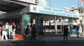 Paphos main bus station building with passengers getting on the car HD Footage
