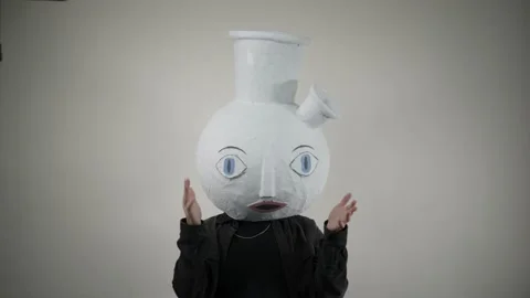 Papier mache head. The bong man talks on camera about the dangers of drugs. Drug Stock Footage 239340446