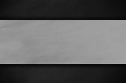 Papper on the dark wall Stock Photos