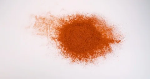 Paprika, capsicum annuum, Powder Exploding against White Background, Slow Mot Stock Footage 112359292