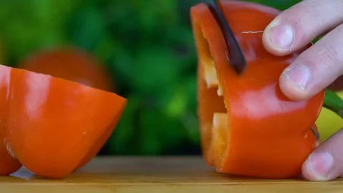 Paprika cut with a knife Stock Footage 85226407