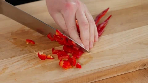Paprika is cut with a knife Stock Footage 253548646