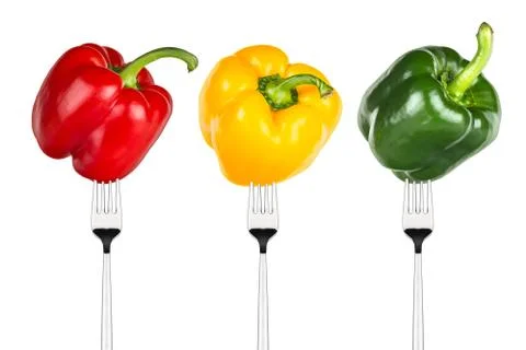 Paprikas on forks Stock Photos
