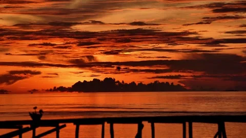 Papuan sunset with a jetty, ocean view - 4k slow motion Stock Footage 280868852