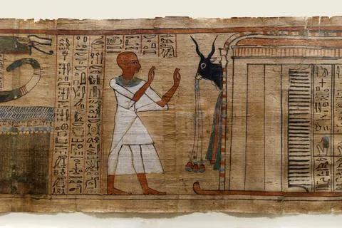 A papyrus depicting a nile farmer and an oryx Stock Photos